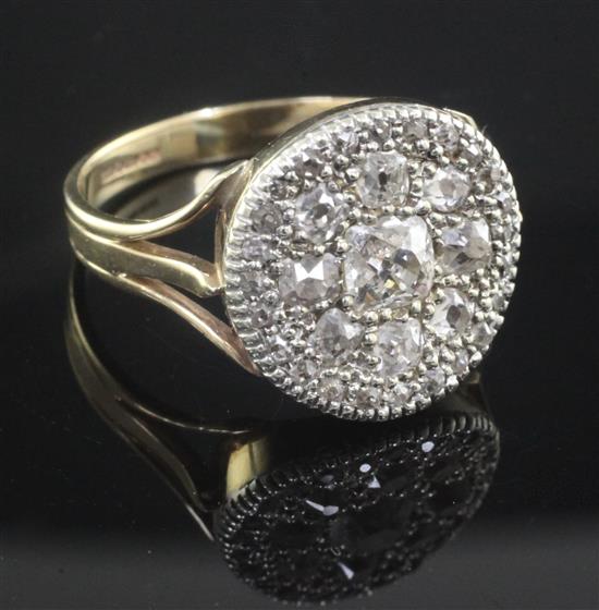 A 1970s Victorian style 9ct gold and diamond cluster ring, size V.